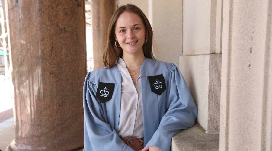 Jess Hobbs Pifer poses in graduation robe 