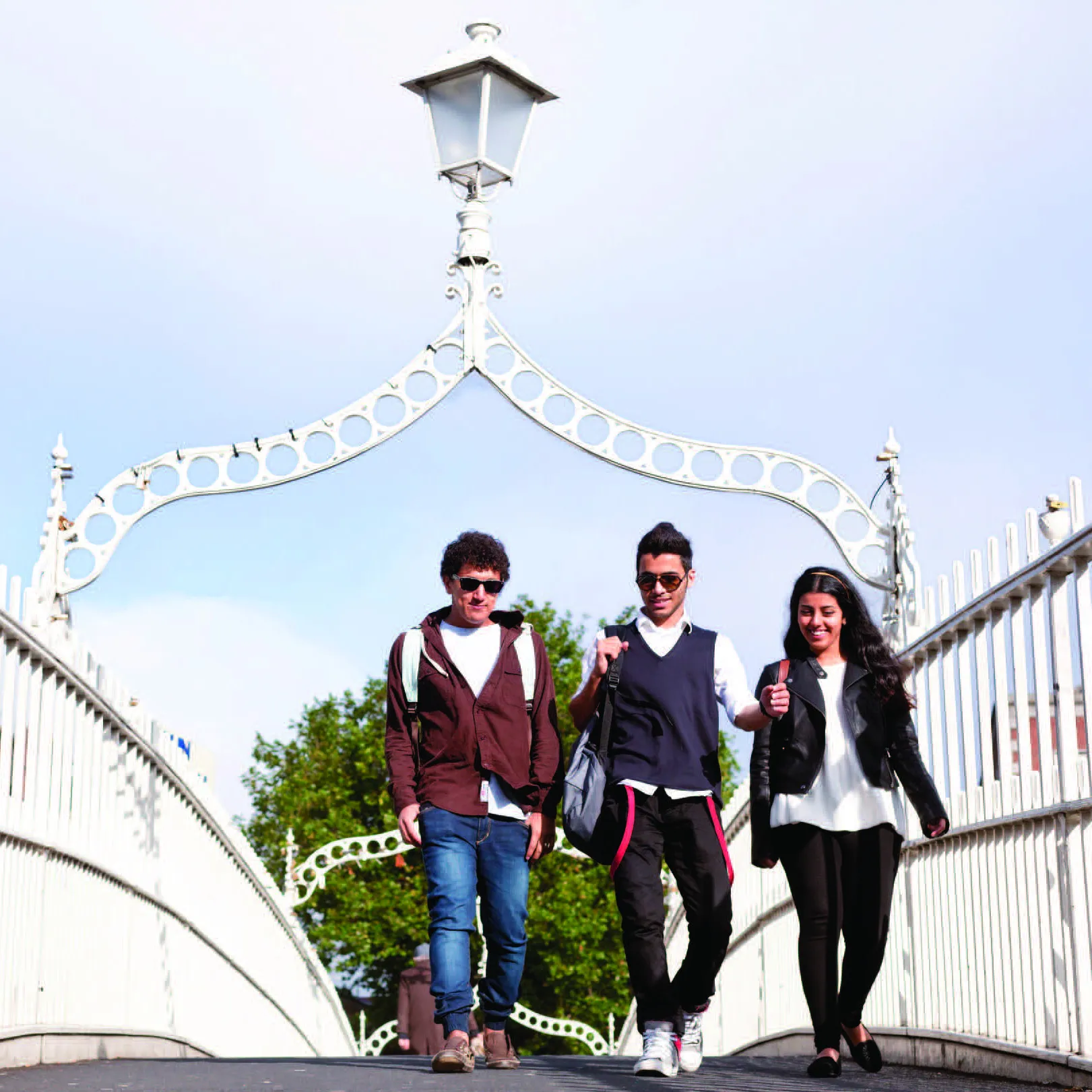 Students walking over the Halpenny Bridge